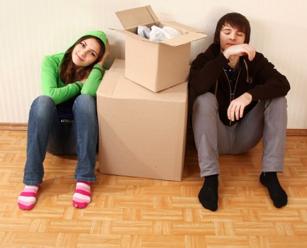 Professional movers preparing office furniture for relocation in Shootershill